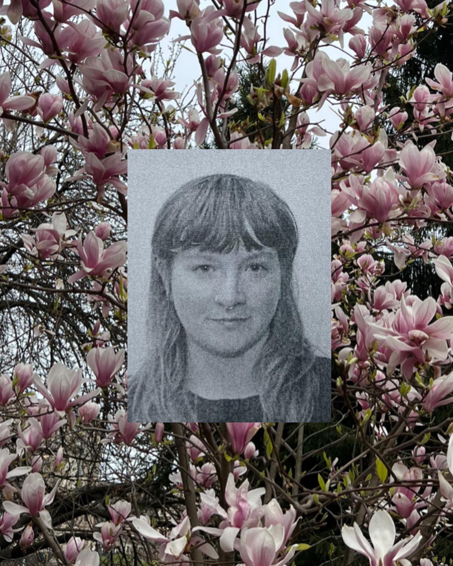 black and white portrait set over magnolia blossoms